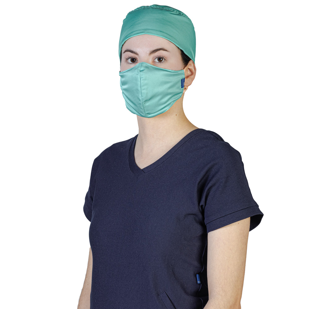 Médico o Doctor vistiendo una  color TURQUESA marca Gallantdale Uniformes Médicos y Quirúrgicos